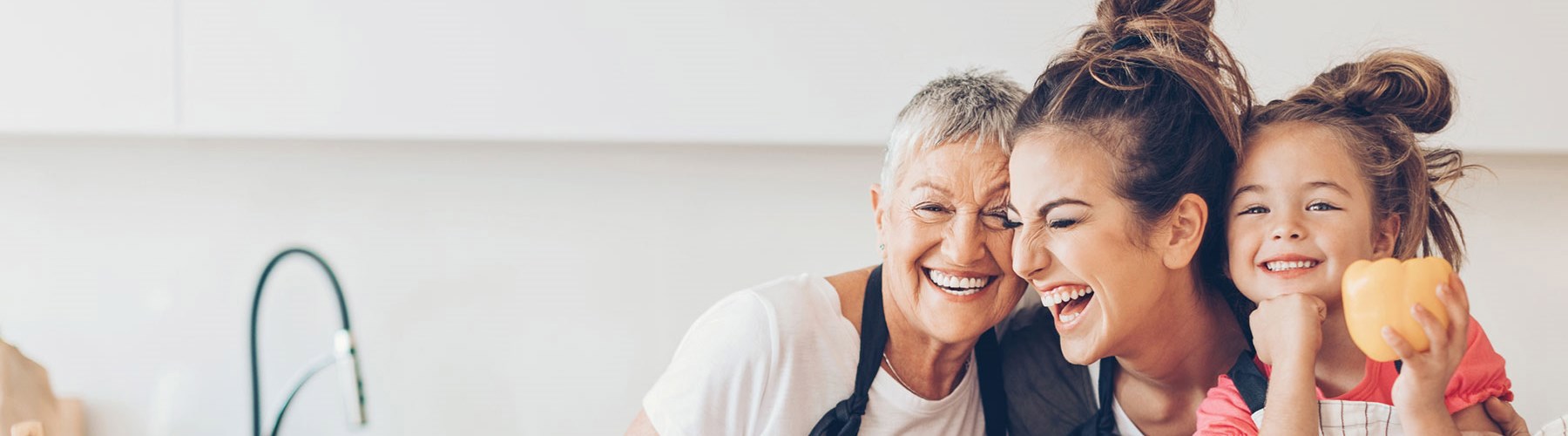 Three generation women smiling together